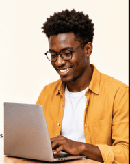 A verified EduMarket contributor working on his laptop
